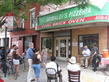 People queueing outside Grimaldi's Pizzeria in Brooklyn